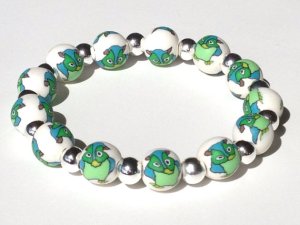 Mr. Owl https://www.etsy.com/listing/179181838/owl-polymer-clay-beads-bracelet-fimo?ref=shop_home_active_2