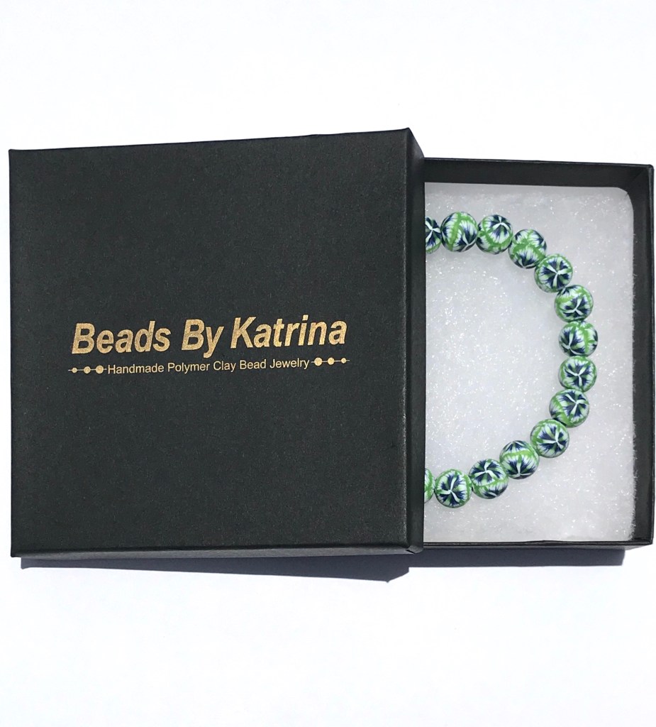 Green, navy, and white polymer clay bead bracelet

